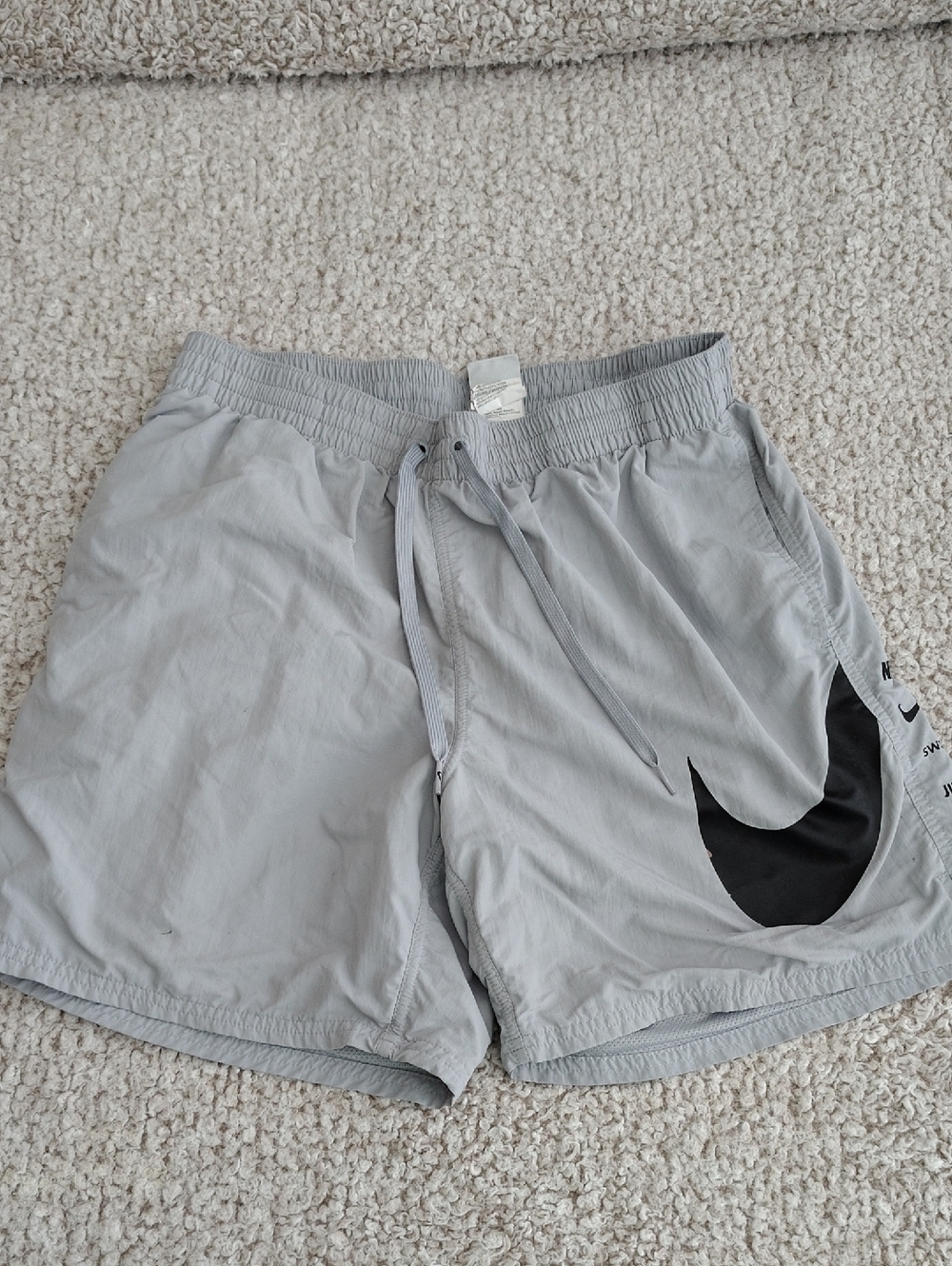 Nike Gray Swim Shorts with Black Swoosh Accent